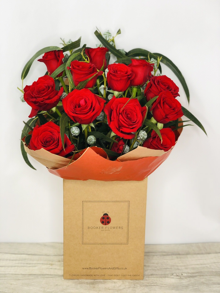 <h2>Dozen Red Roses - Hand-Delivered</h2>
<br>
<ul>
<li>Approximate Dimensions: 55cm x 35cm</li>
<li>Flowers arranged by hand and gift wrapped in our signature eco-friendly packaging and finished off with a hidden wooden ladybird</li>
<li>To give you the best occasionally we may make substitutes</li>
<li>Our flowers backed by our 7 days freshness guarantee</li>
<li>For delivery area coverage see below</li>
</ul>
<br>
<h2>Flower Delivery Coverage</h2>
<p>Our shop delivers flowers to the following Liverpool postcodes L1 L2 L3 L4 L5 L6 L7 L8 L11 L12 L13 L14 L15 L16 L17 L18 L19 L24 L25 L26 L27 L36 L70 If your order is for an area outside of these we can organise delivery for you through our network of florists. We will ask them to make as close as possible to the image but because of the difference in stock and sundry items it may not be exact.</p>
<br>
<h2>Hand-tied Bouquet | 12 Red Roses</h2>
<p>These beautiful roses hand-arranged by our professional florists into a hand-tied bouquet are a delightful choice. This bouquet of one dozen red roses would make the perfect gift for any occasion or to let someone know you are thinking of them.</p>
<p>Handtied bouquets are a lovely display of fresh flowers that have the wow factor. The advantage of having a bouquet made this way is that they are artfully arranged by our florists and tied so that they stay in the display.</p>
<p>They are then gift wrapped and aqua packed in a water bubble so that at no point are the flowers out of water. This means they look their very best on the day they arrive and continue to delight for days after.</p>
<p>Being delivered in a transporter box and in water means the recipient does not need to put the flowers in a vase straight away they can just put them down and enjoy.</p>
<p>Featuring 12 large-headed red roses together with mixed seasonal foliages.</p>
<br>
<h2>Eco-Friendly Liverpool Florists</h2>
<p>As florists we feel very close earth and want to protect it. Plastic waste is a huge problem in the florist industry so we made the decision to make our packaging eco-friendly.</p>
<p>To achieve this we worked with our packaging supplier to remove the lamination off our boxes and wrap the tops in an Eco Flowerwrap which means it easily compostable or can be fully recycled.</p>
<p>Once you have finished enjoying your flowers from us they will go back into growing more flowers! Only a small amount of plastic is used as a water bubble and this is biodegradable.</p>
<p>Even the sachet of flower food included with your bouquet is compostable.</p>
<p>All our bouquets have small wooden ladybird hidden amongst them so do not forget to spot the ladybird and post a picture on our social media pages to enter our rolling competition.</p>
<br>
<h2>Flowers Guaranteed for 7 Days</h2>
<p>Our 7-day freshness guarantee should give you confidence that we will only send out good quality flowers.</p>
<p>Leave it in our hands we will create a marvellous bouquet which will not only look good on arrival but will continue to delight as the flowers bloom.</p>
<br>
<h2>Liverpool Flower Delivery</h2>
<p>We are open 7 days a week and offer advanced booking flower delivery same-day flower delivery 3-hour flower delivery. Guaranteed AM PM or Evening Flower Delivery and also offer Sunday Flower Delivery.</p>
<p>Our florists deliver in Liverpool and can provide flowers for you in Liverpool Merseyside. And through our network of florists can organise flower deliveries for you nationwide.</p>
<br>
<h2>The Best Florist in Liverpool your local Liverpool Flower Shop</h2>
<p>Come to Booker Flowers and Gifts Liverpool for your beautiful flowers and plants. For that bit of extra luxury we also offer a lovely range of finishing touches such as wines champagne locally crafted Gin and Rum Vases Scented Candles and Chocolates that can be delivered with your flowers.</p>
<p>To see the full range see our extras section.</p>
<p>You can trust Booker Flowers and Gifts of delivery the very best for you.</p>
<p><br /><br /></p>
<p><em>5 Star review on Yell.com</em></p>
<br>
<p><em>Thank you Gemma for your fabulous service. The flowers are of the highest quality and delivered with a warm smile. My sister was delighted. Ordering was simple and the communications were top-notch. I will definitely use your services again.</em></p>